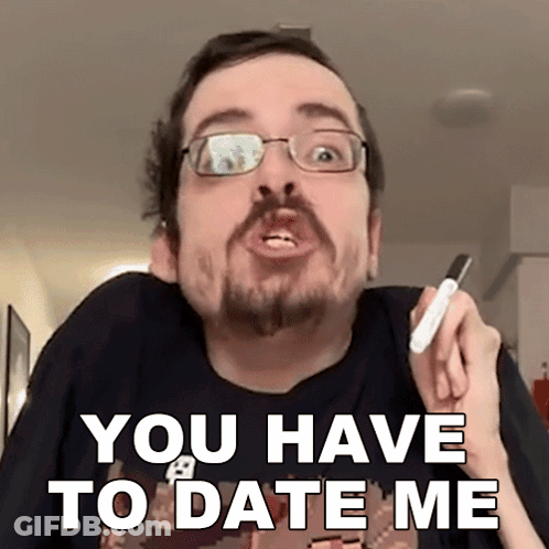 A Man With Glasses And A Beard Is Holding A Marker And Saying " You Have To Date Me " GIF