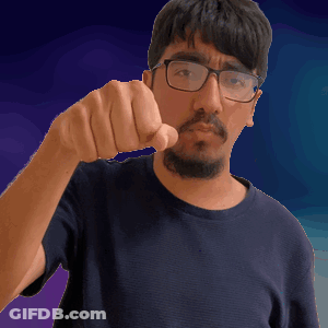 A Man With Glasses And A Beard Is Pointing His Finger GIF