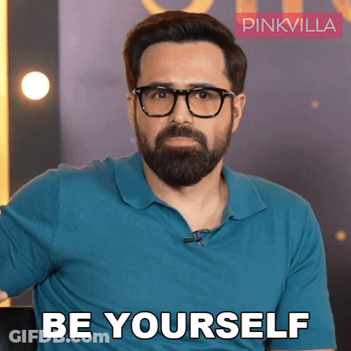 A Man With Glasses And A Beard Is Saying Be Yourself GIF
