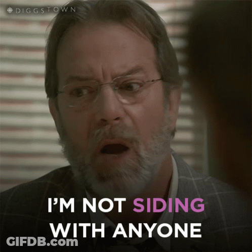 A Man With Glasses And A Beard Is Saying I 'M Not Siding With Anyone GIF