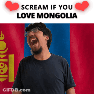 A Man With Glasses And A Beard Is Screaming In Front Of A Mongolia Flag GIF