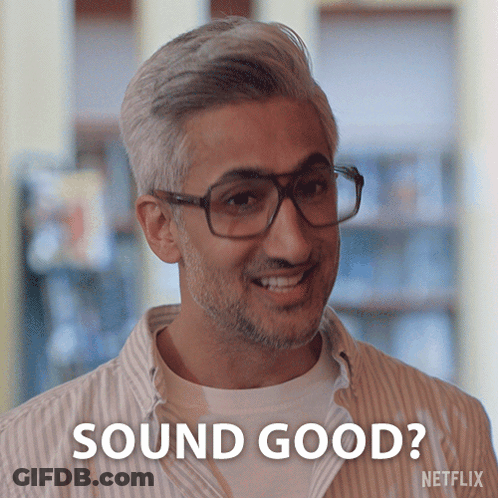 A Man With Glasses And A Beard Is Smiling And Says Sound Good GIF