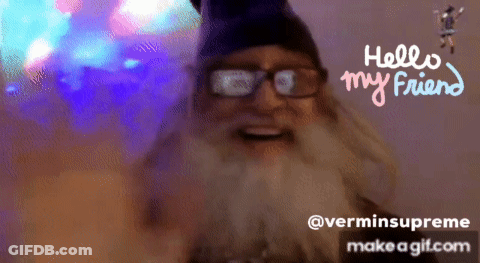 A Man With Glasses And A Beard Is Smiling With The Words Hello My Friend Above Him GIF