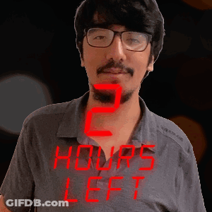 A Man With Glasses And A Beard Is Standing In Front Of A Sign That Says 2 Hours Left GIF