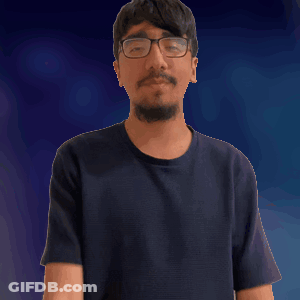 A Man With Glasses And A Beard Is Taking A Selfie With His Arms Outstretched GIF