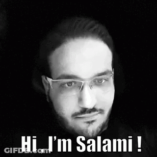 A Man With Glasses And A Beard Is Talking In A Black And White Photo . GIF