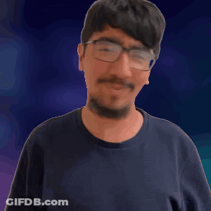 A Man With Glasses And A Beard Is Waving GIF