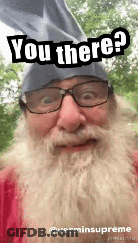 A Man With Glasses And A Beard Is Wearing A Hat That Says You There GIF