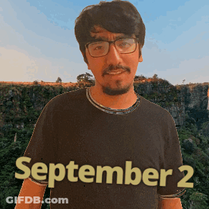 A Man With Glasses And A Beard Is Wearing A Shirt That Says September 2 GIF