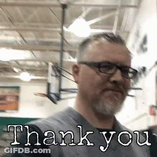 A Man With Glasses And A Beard Is Wearing A Shirt That Says Thank You GIF