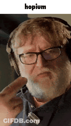 A Man With Glasses And A Beard Is Wearing Headphones And The Word Hopium Is On The Bottom GIF
