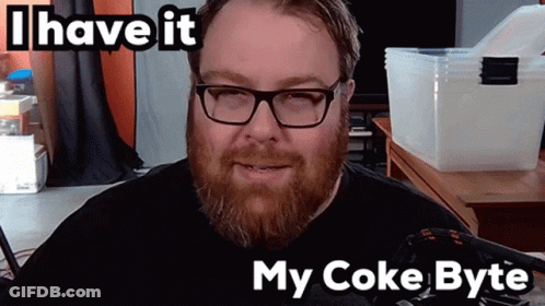 A Man With Glasses And A Beard Says " I Have It " GIF