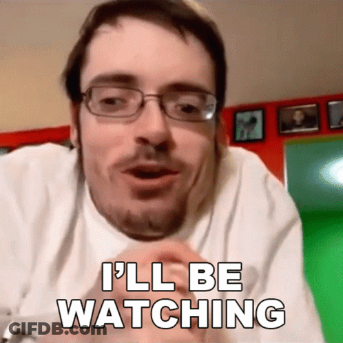 A Man With Glasses And A Beard Says I 'Ll Be Watching GIF