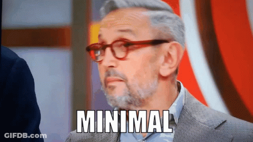 A Man With Glasses And A Beard Says " Minimal " GIF