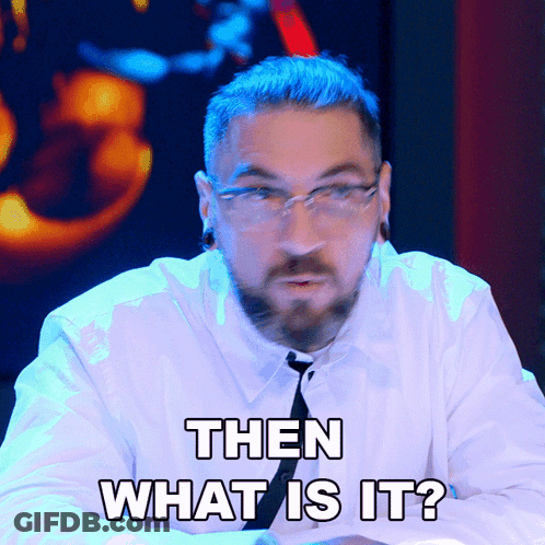 A Man With Glasses And A Beard Says " Then What Is It " GIF
