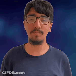 A Man With Glasses And A Beard Sticks Out His Tongue GIF