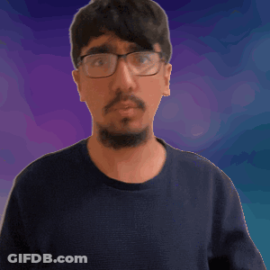 A Man With Glasses And A Beard Waves His Hand In Front Of A Purple Background GIF
