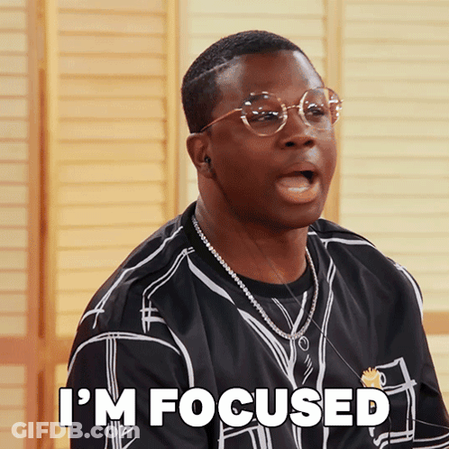 A Man With Glasses And A Black Shirt Says I 'M Focused GIF
