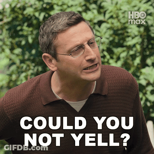 A Man With Glasses And A Brown Shirt Says " Could You Not Yell " GIF