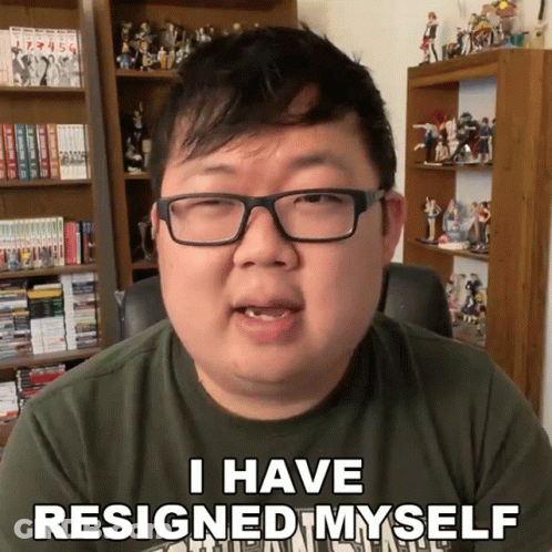 A Man With Glasses And A Green Shirt Says I Have Resigned Myself GIF