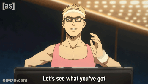 A Man With Glasses And A Headband Says Let 'S See What You 'Ve Got On A Screen GIF
