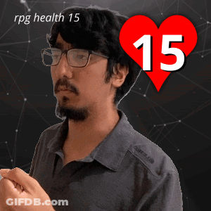 A Man With Glasses And A Heart That Says 15 On It GIF