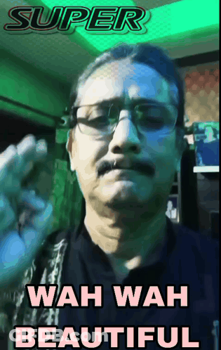 A Man With Glasses And A Mustache Has Wah Wah Beautiful Written Below Him GIF