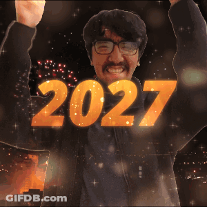 A Man With Glasses And A Mustache Holds His Fist Up In The Air With The Year 2027 Written Above Him GIF