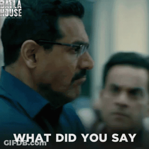 A Man With Glasses And A Mustache Is Asking What Did You Say GIF