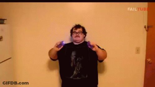 A Man With Glasses And A Mustache Is Holding A Purple Object In Front Of A Wall With Failtube Written On It GIF
