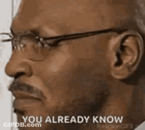 A Man With Glasses And A Mustache Is Looking At The Camera And Saying `` You Already Know '' . GIF