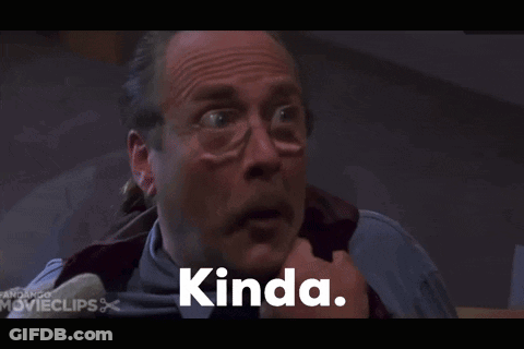 A Man With Glasses And A Mustache Is Smiling And The Word Kinda Is On The Screen GIF
