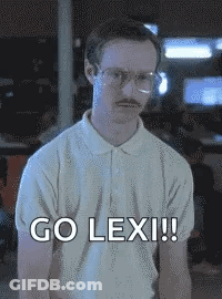 A Man With Glasses And A Mustache Is Standing In Front Of A Sign That Says Go Lex !! GIF