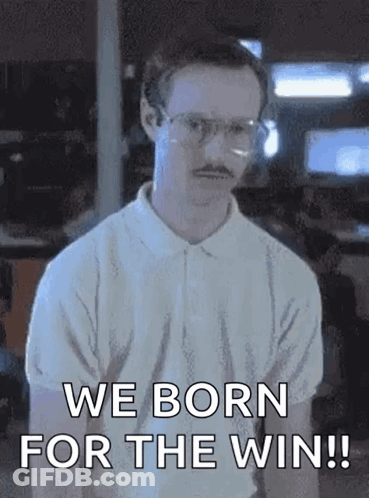 A Man With Glasses And A Mustache Is Standing In Front Of A Sign That Says `` We Born For The Win ! '' GIF