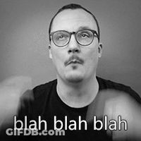 A Man With Glasses And A Mustache Is Wearing A Black Shirt And Says Blah Blah Blah GIF