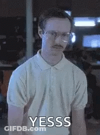 A Man With Glasses And A Mustache Is Wearing A White Polo Shirt And Making A Funny Face . GIF