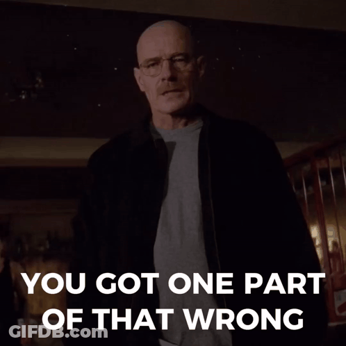 A Man With Glasses And A Mustache Pointing Up With The Words You Got One Part Of That Wrong Behind Him GIF