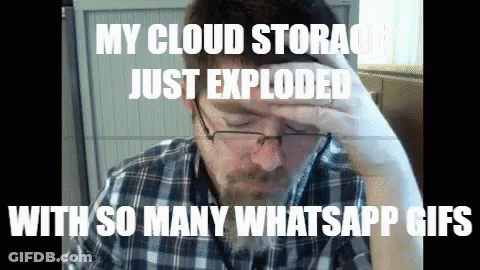 A Man With Glasses And A Plaid Shirt Holds His Hand To His Forehead With The Caption " My Cloud Storage Just Exploded GIF