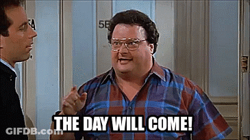 A Man With Glasses And A Plaid Shirt Says The Day Will Come . GIF