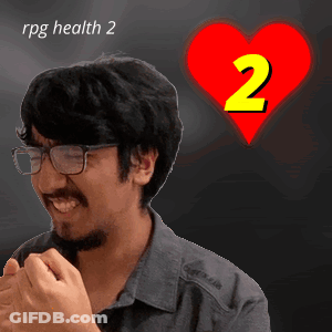 A Man With Glasses And A Red Heart With The Number 2 GIF
