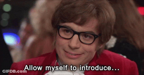 A Man With Glasses And A Red Jacket Says Allow Myself To Introduce ... GIF