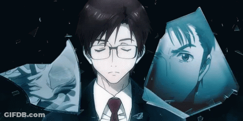 A Man With Glasses And A Red Tie Stands In Front Of A Broken Mirror GIF