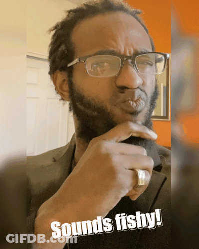 Man With Glasses Saying Sounds Fishy GIF