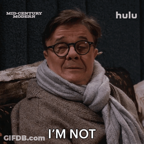A Man With Glasses And A Scarf Around His Neck Says I 'M Not GIF