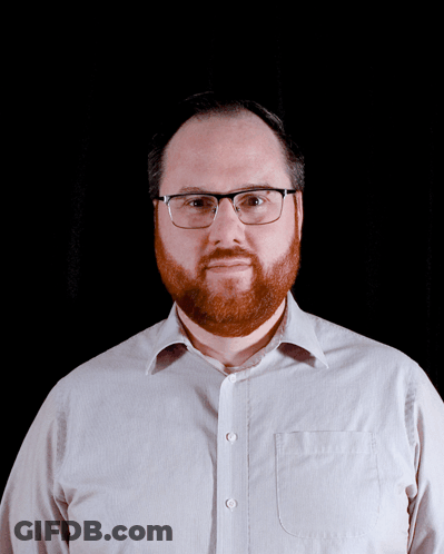 A Man With Glasses And A Surprised Look On His Face With The Words Woah Above Him GIF