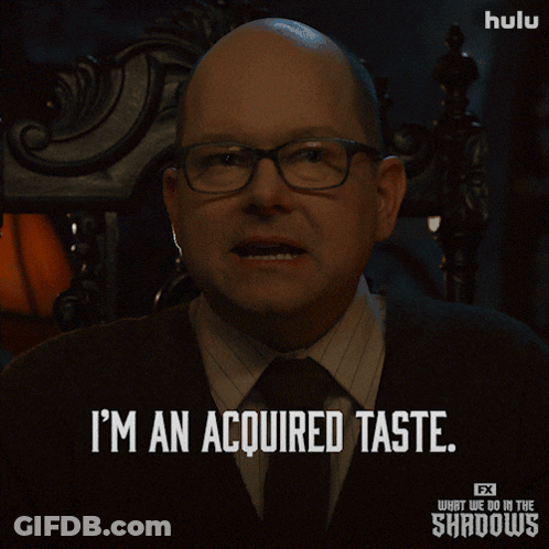 A Man With Glasses And A Tie Says I 'M An Acquired Taste GIF