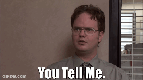 A Man With Glasses And A Tie Says " You Tell Me " GIF