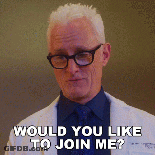 A Man With Glasses And A White Coat Says Would You Like To Join Me GIF