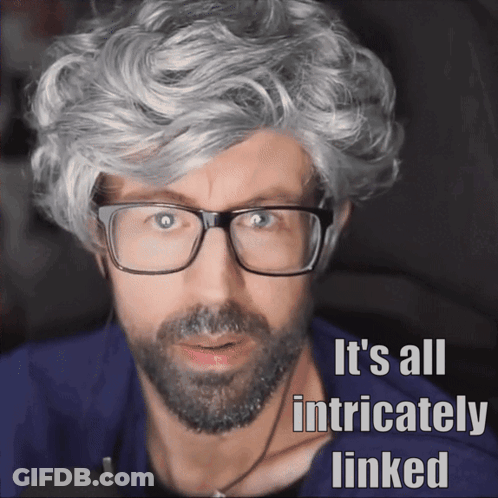 A Man With Glasses And Gray Hair Has The Words It 'S All Intricately Linked GIF