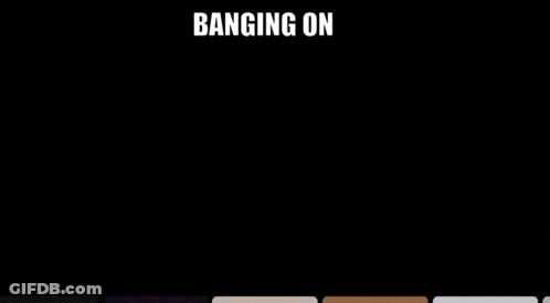 A Man With Glasses And Headphones Is Banging On A Glass GIF